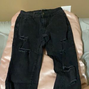 Wax black ripped jeans